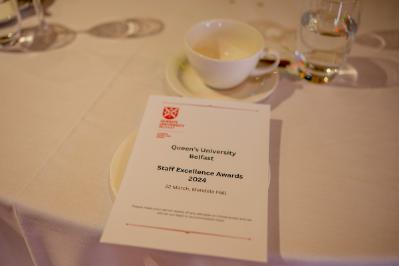Image shows a menu that reads: Queen's University Belfast Staff Excellence Awards 2024