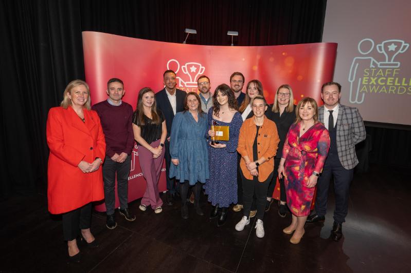 Image shows Co-Chairs of the Staff Excellence Awards Judging Panel, Gillian Magee and Mairead Regan, with the Residential Life team and host Andrew Ryan