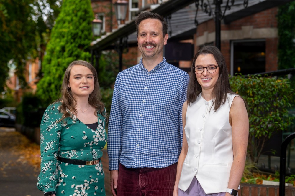 three members of the Postdoc Society at the Postdoc Showcase 2024, Queen's University Belfast