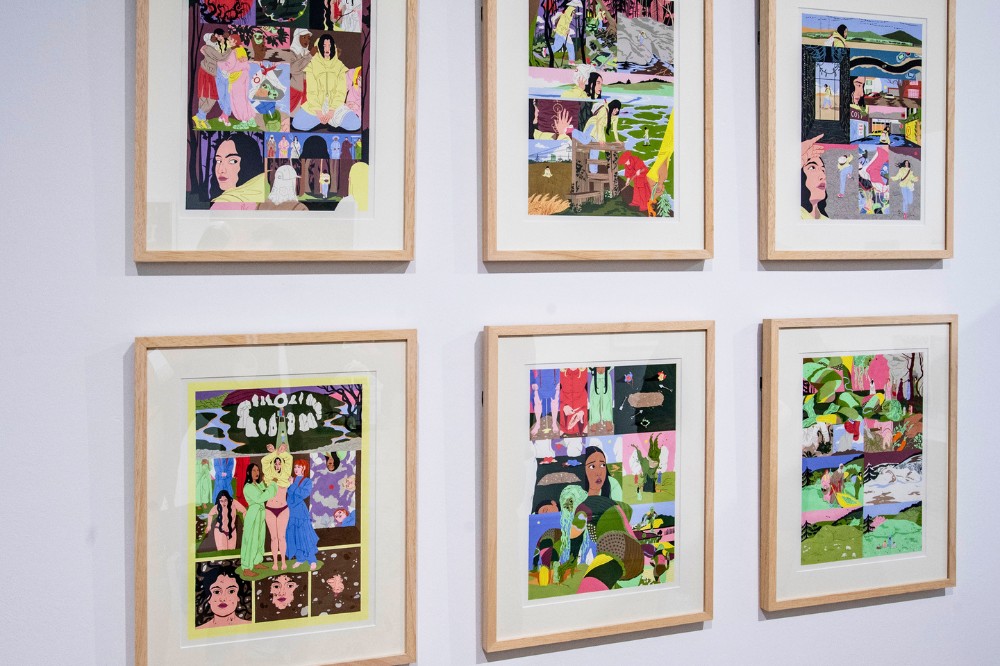 six framed artworks displayed on a white wall